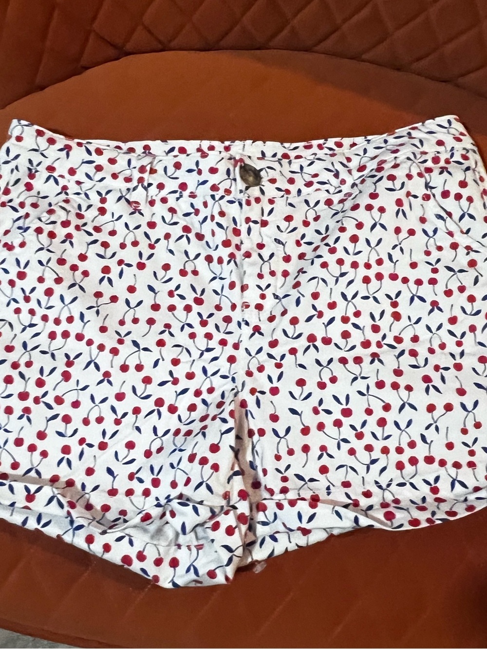 SO White Jean Shorts with Red Cherry Print and Navy Leaf Accents